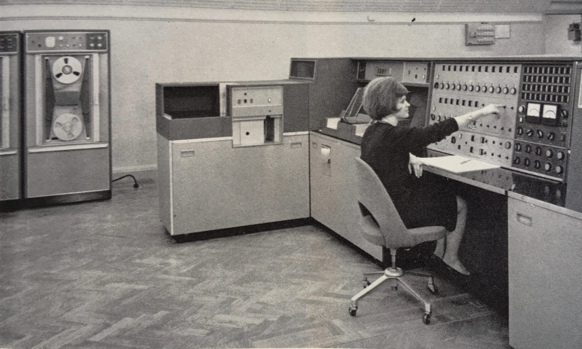 Vintage computer with technician
